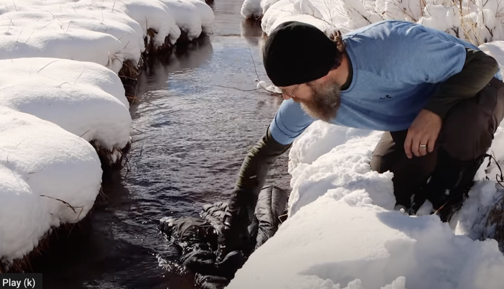 Dunking jacket in freezing water