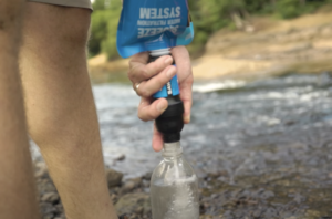 Squeeze filter into bottle