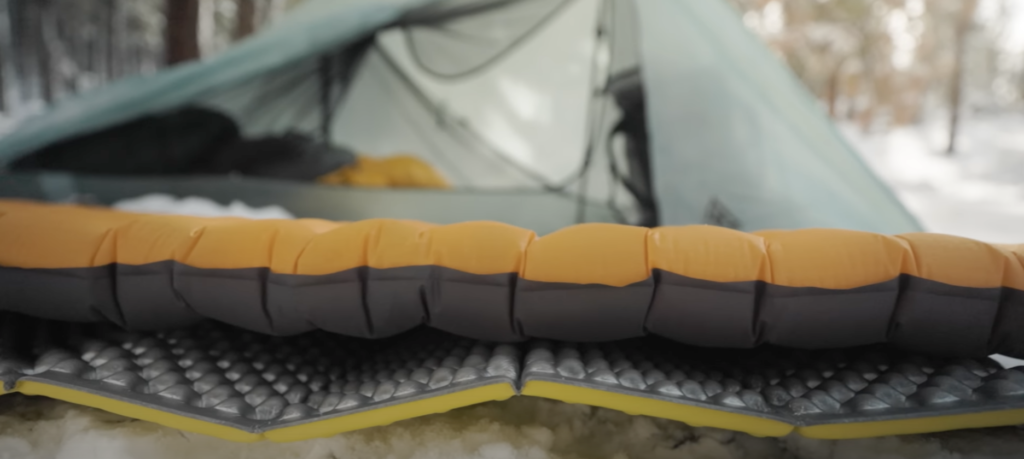 Layered sleeping pads